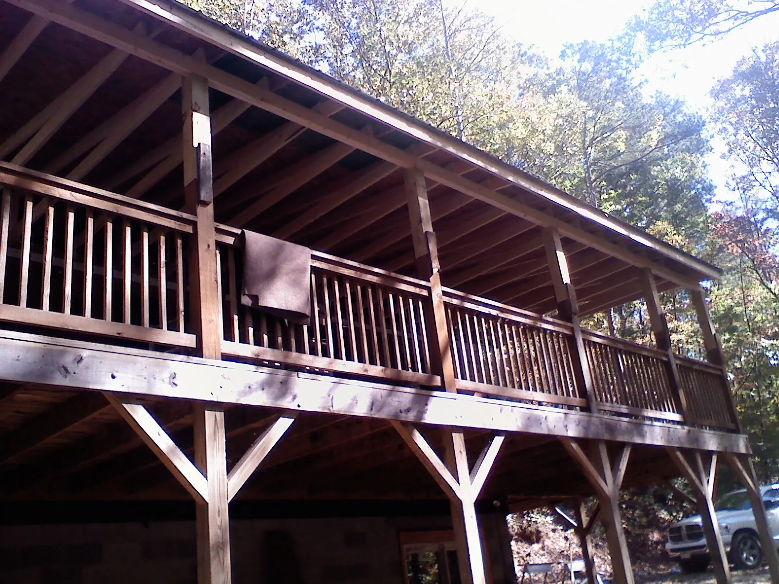 Timber framing under a new elevated porch and deck — Roof Leak Repair in North Little Rock by Roofing Brothers